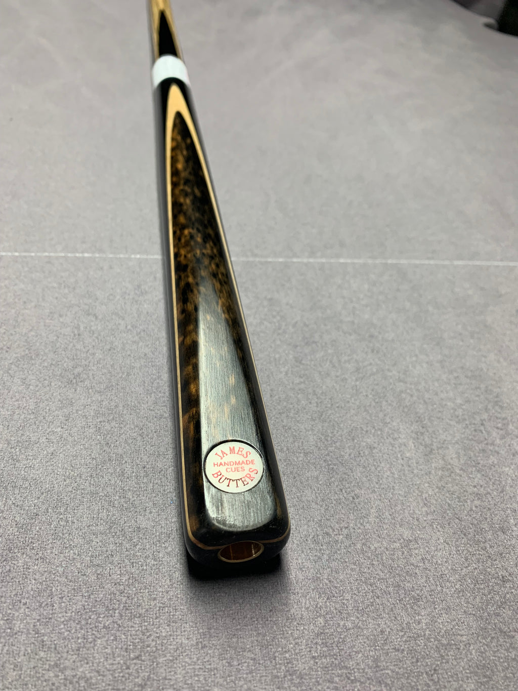 James Butters Cue