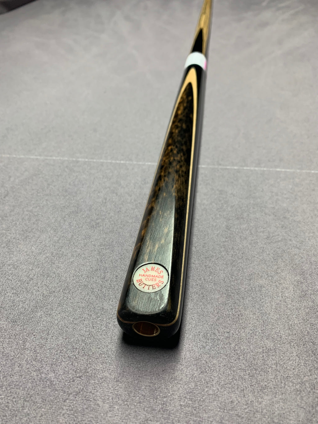 James Butters Cue