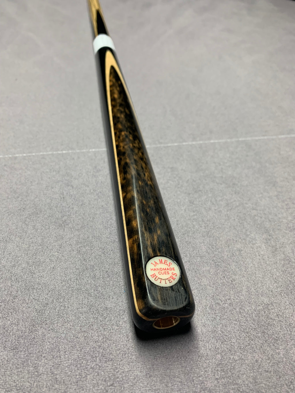 James Butters Cue