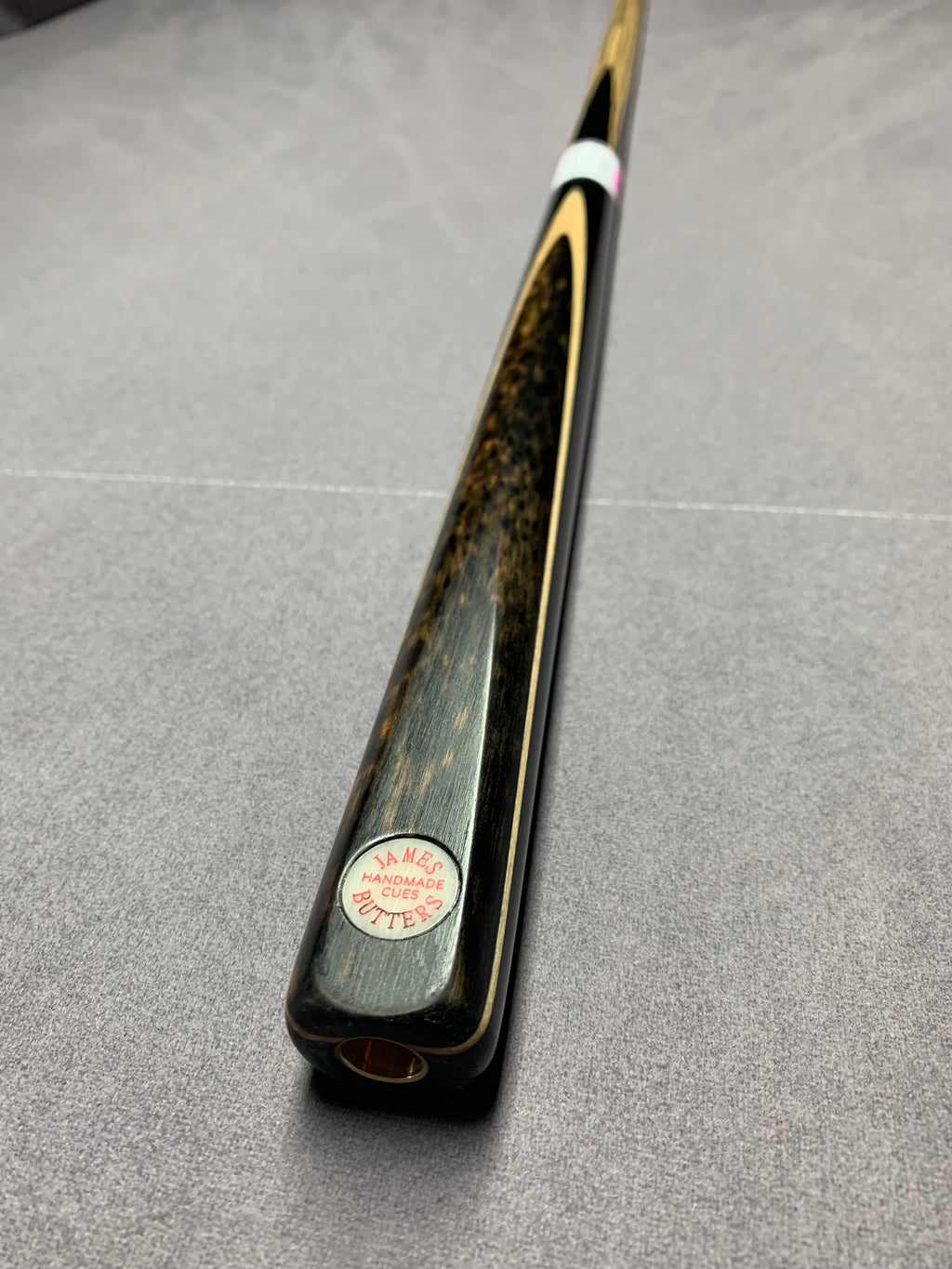 James Butters Cue