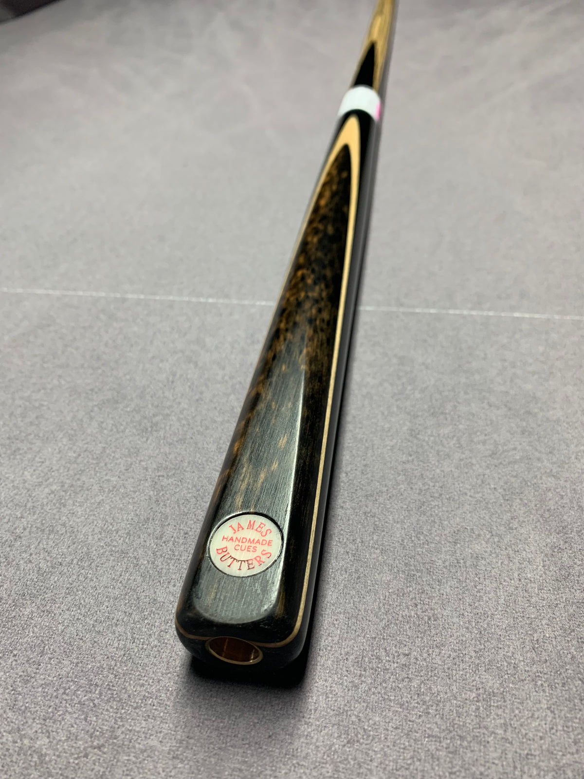 James Butters Cue